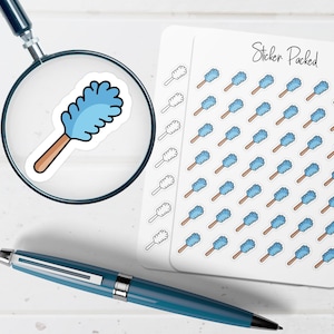 May include: A sheet of stickers featuring a cartoon illustration of a blue duster with a brown handle. The stickers are arranged on a white background with the text "Sticker Packed". A magnifying glass and a blue pen are also in the image.