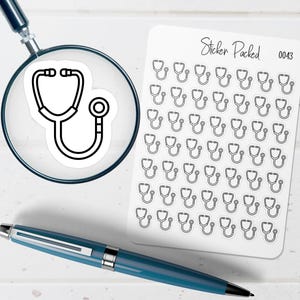 May include: A sheet of stickers featuring a stethoscope design, with the text "Sticker Packed 0043". A magnifying glass shows a single stethoscope sticker. A blue pen is also in the image.