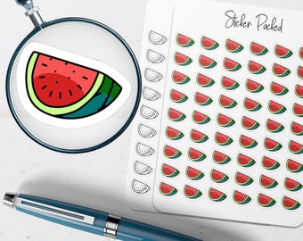 May include: A sticker sheet labeled Sticker Packed featuring rows of small watermelon slice stickers in red, green, and black. A magnifying glass focuses on one larger watermelon slice sticker, and a blue pen lies horizontally below the sheet.