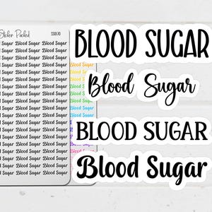 May include: A sheet of white stickers with the words "BLOOD SUGAR" in various fonts and styles. The text is primarily black, with some instances in a handwritten script. The stickers are for health-related organization.