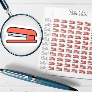 May include: A sheet of stickers featuring a coral-colored stapler design, with a magnifying glass showing a close-up of the stapler sticker. A blue pen is in the foreground. The sheet of stickers has the text "Sticker Packed".