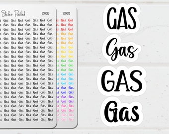 May include: White stickers with the word "GAS" in various fonts. The stickers are in both uppercase and lowercase. There are also sticker sheets with the word "Gas" repeated in a pattern. The text "Sticker Packed" is visible.