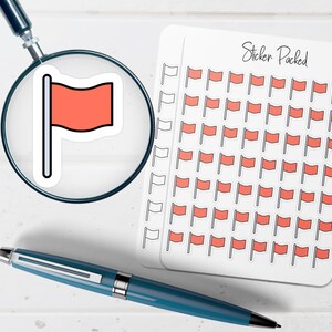 May include: A sheet of flag stickers with a magnifying glass and a pen. The stickers are small, with a red flag design. The magnifying glass shows a single flag sticker. The pen is blue.