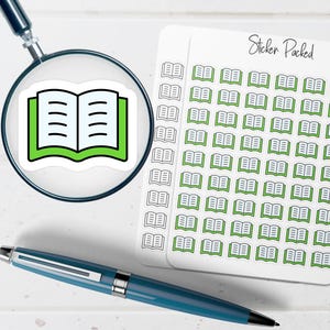 May include: A sticker sheet with multiple small book stickers, each with a green border. A single book sticker is magnified by a magnifying glass. A blue pen is also in the image. The text "Sticker Packed" is on the sticker sheet.