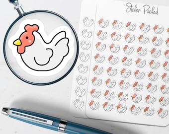 May include: A white sticker with a cartoon chicken design is magnified by a magnifying glass. The chicken has a red comb and wattle, a yellow beak, and a black outline. A sheet of chicken stickers and a blue pen are also visible.