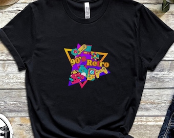 May include: Black t-shirt with a graphic of a yellow triangle filled with colorful 90s retro video game icons and the text "90's Retro".