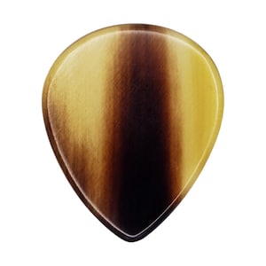 May include: A teardrop-shaped guitar pick with a striped pattern in shades of brown and yellow. The pick has a smooth, polished surface and a rounded top.