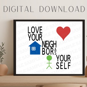 May include: A black framed print with white background and the text "Love your neighbor as yourself" in black. The text is surrounded by a red heart, a blue house, and a green stick figure.