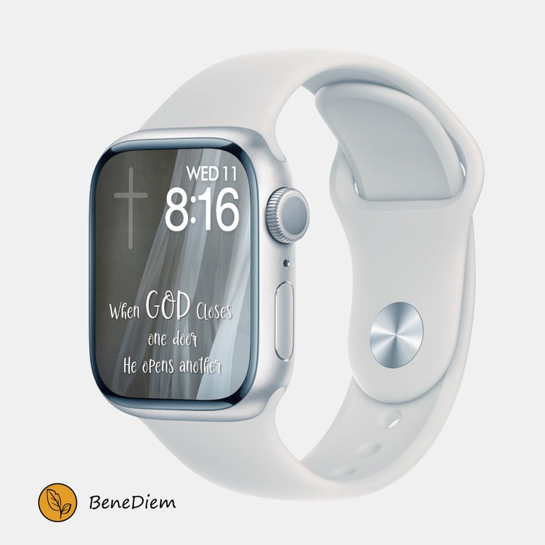 May include: A white Apple Watch with a white strap. The watch face shows the time 8:16, the day of the week "WED 11", and the text "When GOD closes one door He opens another".