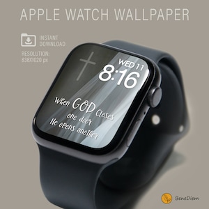 May include: A black Apple Watch with a white digital clock face displaying "WED 11 8:16". The watch face also features a white cross and the text "When GOD closes one door He opens another".