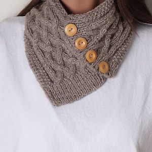 gray buttoned neck collar accessory