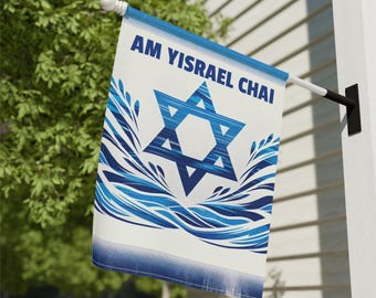 May include: A white flag with the text "AM YISRAEL CHAI" in blue, featuring a blue Star of David and stylized blue water waves. The flag is mounted on a white and black pole, attached to a white wall.