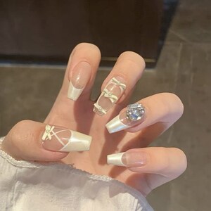 Elegant Ballerina Press-on Nails: Pearl Rhinestone Bow Design