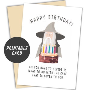 May include: Printable birthday card featuring a cartoon illustration of Gandalf from The Lord of the Rings holding a birthday cake with candles. The text reads "Happy Birthday! All you have to decide is what to do with the cake that is given to you."