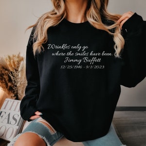 Wrinkles Only Go Where The Smiles Have Been - Jimmy Buffett - Unisex Heavy Blend™ Crewneck Sweatshirt