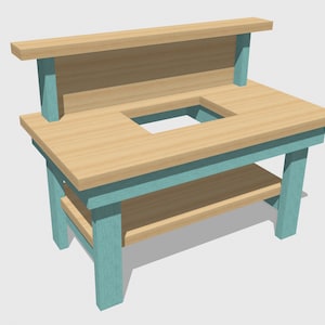 Puede incluir: Un banco de trabajo de madera con una tapa de madera clara y patas y estante de color azul turquesa. El banco tiene un recorte en la superficie superior y un salpicadero.