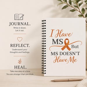 May include: A white spiral-bound journal with the text I Have MS But MS DOESN'T Have Me and an orange awareness ribbon. To the left, text reads JOURNAL. Write it down. Let it out. REFLECT. Understand your thoughts and feelings. HEAL. Take one step at a time.