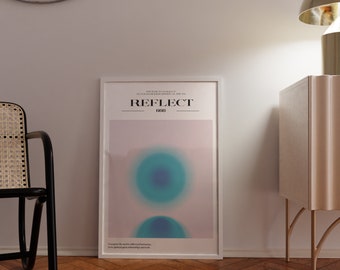 May include: A framed poster with a white background and two blue and purple circles. The poster has the text "REFLECT 0030" at the top.