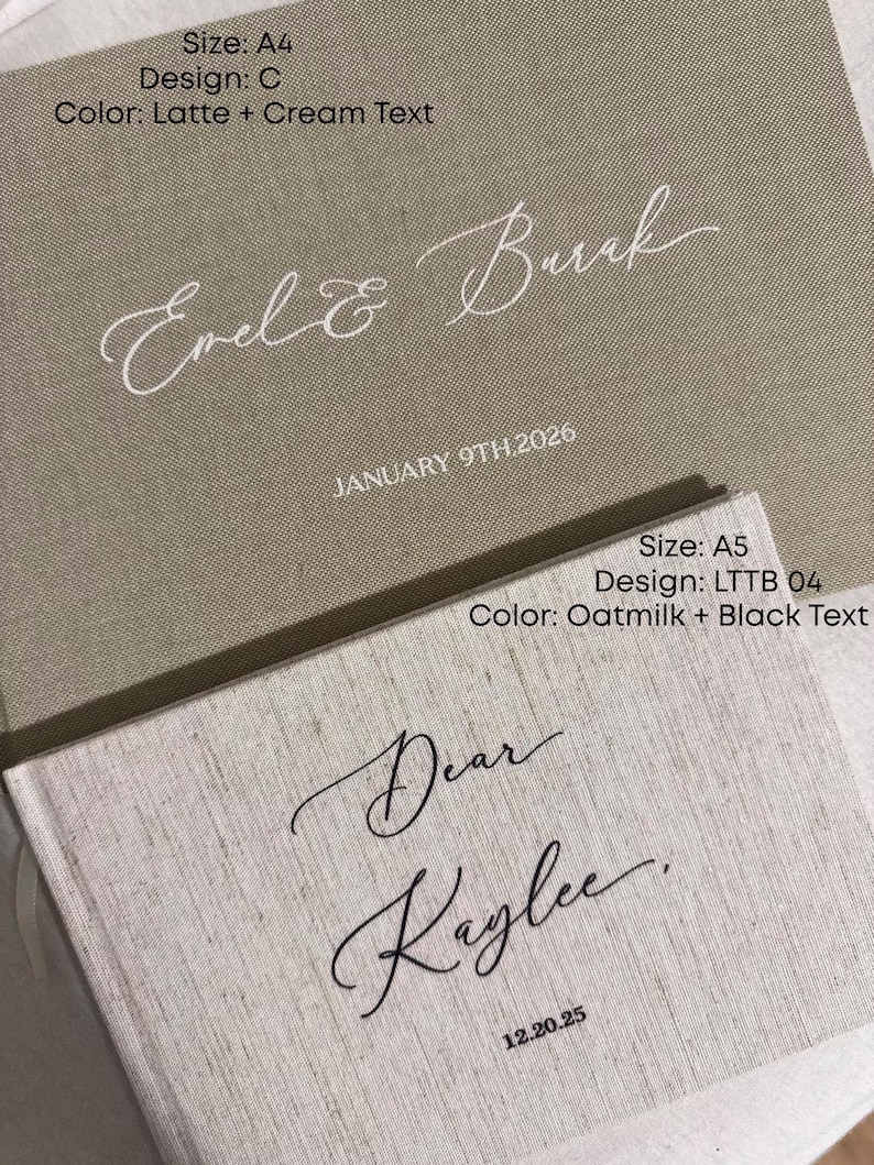 K&ouml;nnte beinhalten: Zwei personalisierte B&uuml;cher mit Leinenstruktur. Das obere Buch ist lattefarben mit cremefarbenem Text "Evel & Buck" und "JANUARY 9TH.2026". Das untere Buch ist hafermilchfarben mit schwarzem Text "Dear Kaylee" und "12.20.25".