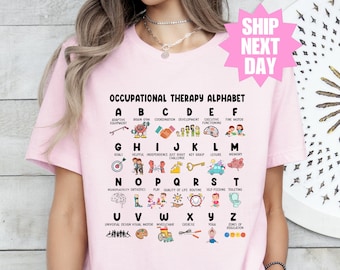 May include: Pink t-shirt featuring a white graphic of an occupational therapy alphabet. The alphabet is illustrated with images and words representing different aspects of occupational therapy.