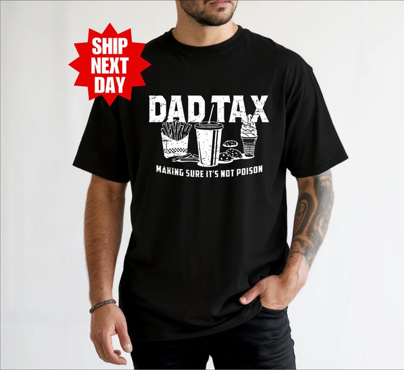 a man wearing a black shirt with the words dadtax on it