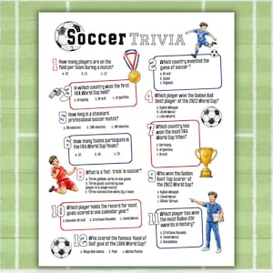 May include: A white sheet titled Soccer Trivia featuring twelve numbered questions about soccer history and rules. The page includes illustrations of soccer balls, a gold medal, a whistle, a trophy, and cartoon soccer players in blue and red kits.