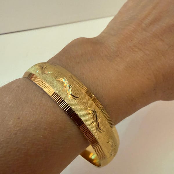 Monet Gold Tone Brushed Satin Bangle Bracelet | Etched Leaf Diamond Cut Design