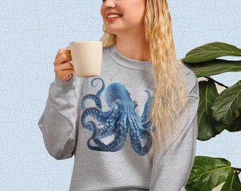 May include: A light grey sweatshirt with a detailed blue octopus design. The octopus is centered on the chest, with its tentacles spread out. The sweatshirt is made of a soft material, suitable for casual wear.