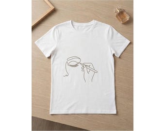 T-shirt minimalista per il trucco, maglietta con grafica di un viso in stile line art, regalo per truccatori, maglietta per saloni di bellezza, elegante t-shirt minimalista in cotone