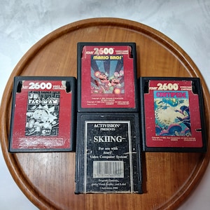 Lot of 4 Atari 2600 Games - Mario Bros, Jr. Pac-Man, Centipede, Skiing - Vintage Classics