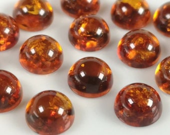 Pierre gemme ambrée de lot de forme ronde de cabochon ambre de 12 millimètres pour la fabrication de bijoux