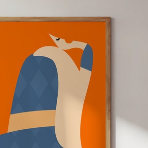 May include: Abstract art print depicting a seated figure. The artwork has a bright orange background with a figure in blue, beige, and tan tones. The figure's clothing features a diamond pattern. The print is framed in a wooden frame.