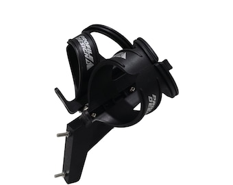 May include: Black bicycle water bottle cage with the text "PROFILE DESIGN" in white. The cage is made of a durable material and features a secure design to hold a water bottle. Includes mounting hardware.