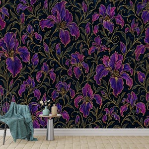 May include: A wallpaper pattern featuring vibrant purple and magenta iris flowers with gold-toned outlines on a dark navy background. A dark wooden chair with a teal knit throw blanket and a small side table with two vases sit in front of the wall.