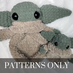 May include: Two crocheted plush toys in the shape of a popular fictional character. The larger toy is green and brown, while the smaller toy is green and brown. The toys are sitting on a white surface. PATTERNS ONLY.