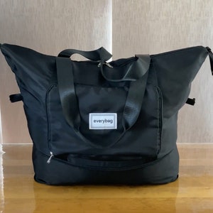 Sac de sport pliable et résistant à l'eau pour les voyages, la salle de sport, le yoga, les couches et l'université