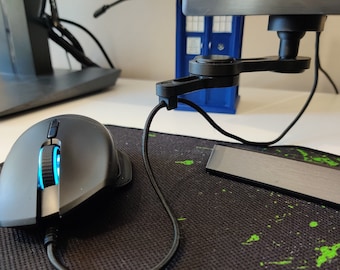 Monitor-mounted mouse cable bungee