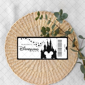 May include: A black and white Disneyland Paris ticket design. The ticket features the Disneyland logo, a castle silhouette, and the text "We are going to..." and "ADMIT ONE". The ticket is decorated with stars.