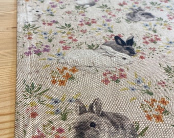 Table runner featuring rabbits and flowers