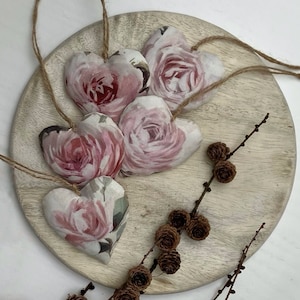 Fabric hanging hearts sewn from rose fabric