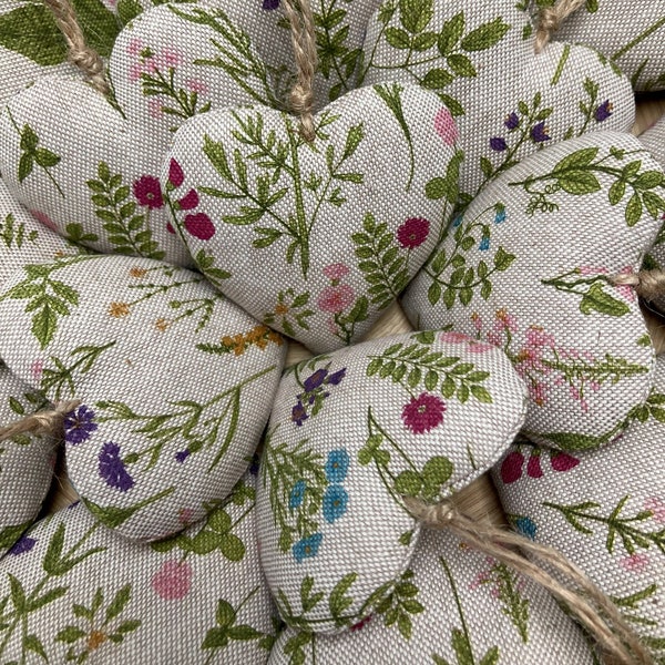 Fabric hanging hearts sewn from spring floral fabric