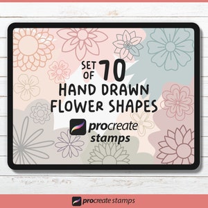 May include: A digital tablet screen displaying a set of 70 hand-drawn flower shapes for Procreate stamps. The screen is filled with various flower designs in shades of pink, blue, and gray.