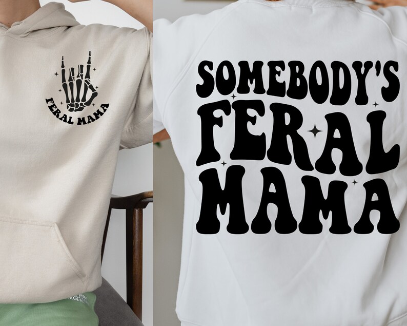 May include: Two sweatshirts with the text "Somebody's Feral Mama" in a retro font. One sweatshirt is beige with a black skeleton hand making a rock and roll sign. The other sweatshirt is white with black text.