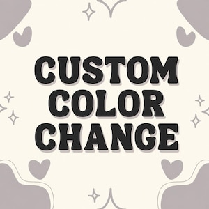 May include: A square graphic featuring the black text CUSTOM COLOR CHANGE in a bold, rounded font. The background is a light cream colour decorated with soft grey abstract shapes, including heart-like forms and small four-pointed star icons.
