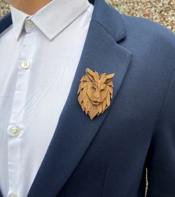 Wooden lion brooch sale