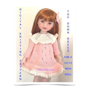 May include: A doll wearing a pink knitted dress with a white collar and trim. The dress is designed for a 14/15 inch doll. The image includes text that reads "DIGITAL KNITTING PATTERN" and "TOP DOWN DRESS".