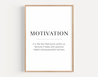 May include: A printable wall art poster with a black and white design. The poster features the word "MOTIVATION" in large letters at the top and a definition of the word below. The definition reads: "It is the fire that burns within us. Nurture it daily with positive habits and purposeful actions."