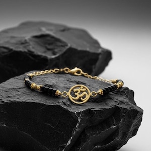 Svart Onyx-armband: Guldfärgad Om-berlock, Aromaterapi-diffusormanschett