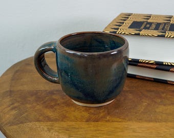blue and brown espresso mug