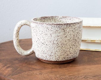 large toasty white speckled mug